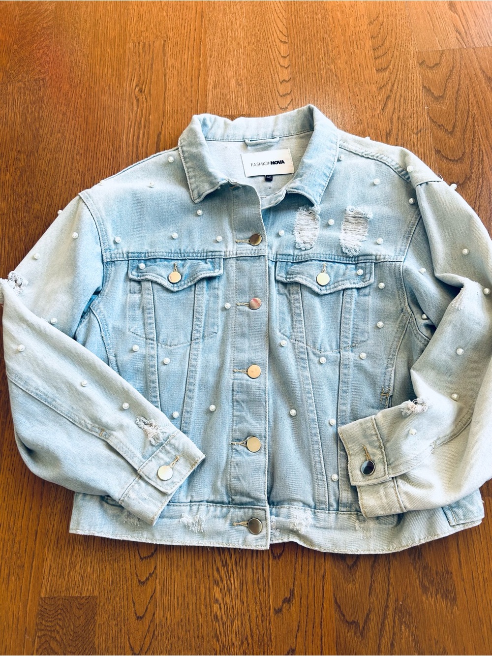 Fashion Nova light wash, pearl studded jean distressed jacket